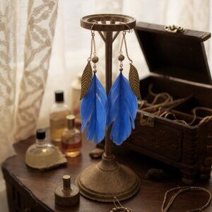 Body Central Vibrant Blue Feather Earrings with Gold Accents